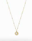 Gouden ketting Cala met een schelp en parel – productfoto