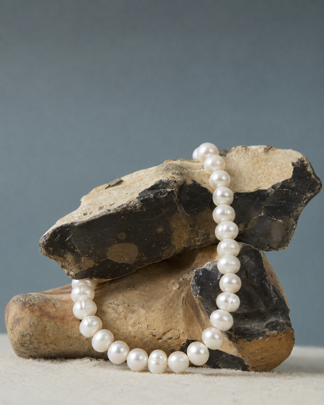 Gouden armband Serena met parels gelegd op stenen